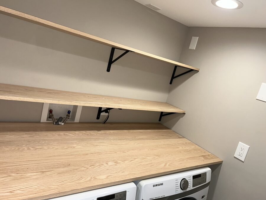 Laundry shelving and finish detail with clean utility-room storage