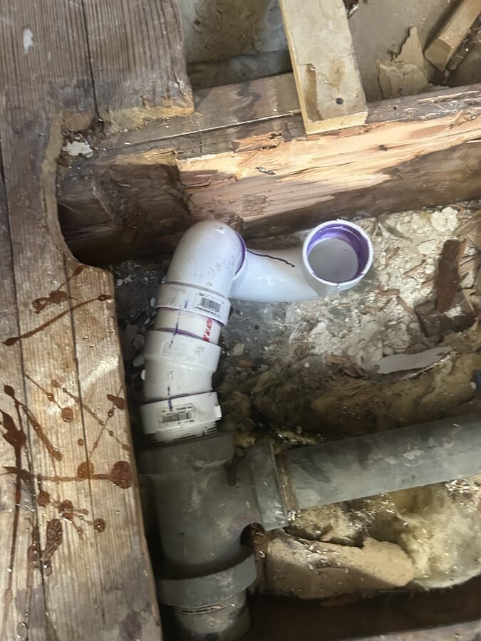 Plumbing access and repair detail coordinated before finish work